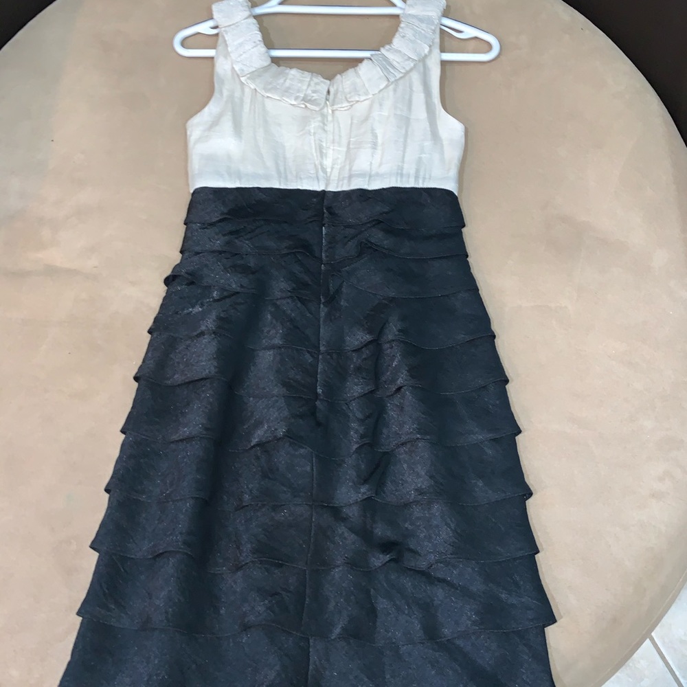 2 tone dress with flower detail around neckline